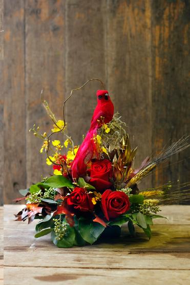 cardinal theme flower arrangement